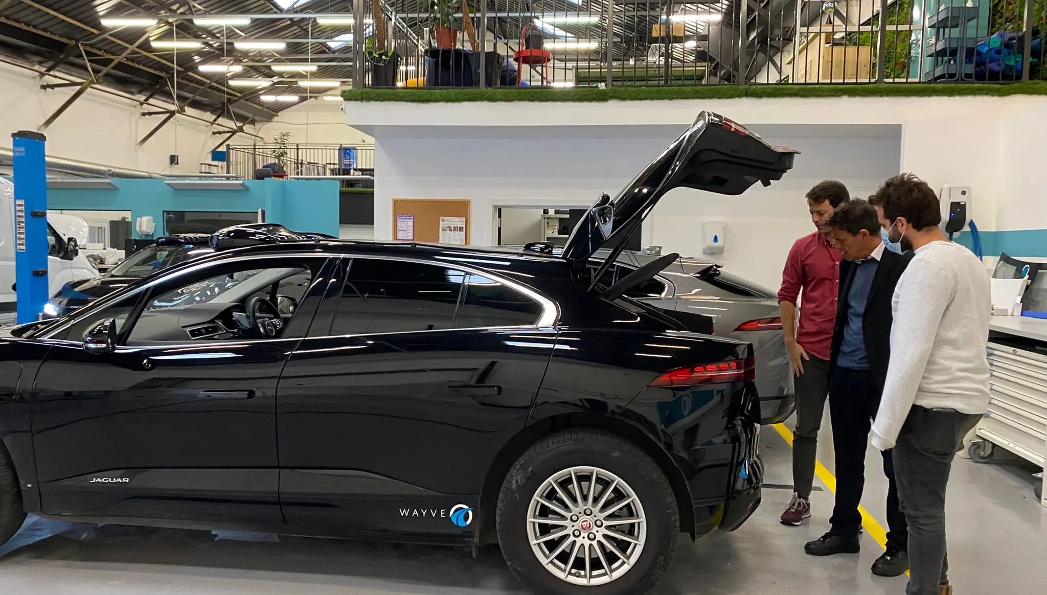 Spencer and Brent visiting the Wayve car 